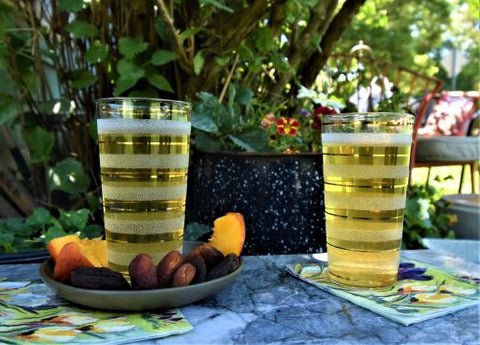 Apricot Green tea from Lake Missoula Tea Company, featuring fresh green tea leaves with apricot aroma in a clear cup.