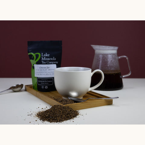 Chicory Joe tea in a white Fellow mug with a clear steeper, served in a Lake Missoula Tea Company tea setup.