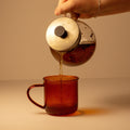 Lake Missoula Tea Company Pachamama Chai tea in a cup, showcasing its rich, spiced blend with a steaming hot appearance.