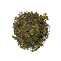 Sweet cherry blossom tea from Lake Missoula Tea Company in a clear glass teapot with blooming cherry blossoms inside.