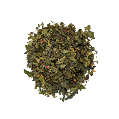 Sweet cherry blossom tea from Lake Missoula Tea Company in a clear glass teapot with blooming cherry blossoms inside.