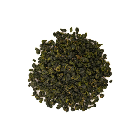 High Mountain Oolong tea leaves from Lake Missoula Tea Company, brewed in a clear glass teapot showcasing the tea's amber color.