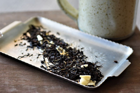 Cup of Lake Missoula Tea Company's French Vanilla Almond tea in a mug, showcasing a warm, inviting beverage with vanilla and almond flavors.
