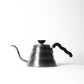 Hario Buono kettle for tea brewing, stainless steel teaware with a gooseneck spout, used for precise pouring and tea preparation.