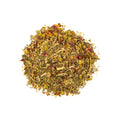 A calming cup of Lake Missoula Tea Company's Catch Some Zzzz's herbal tea with loose tea leaves and a cozy setting.
