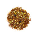 A cup of Gin & Cream Rooibos tea from Lake Missoula Tea Company, showcasing a steaming cup with a rich amber color.