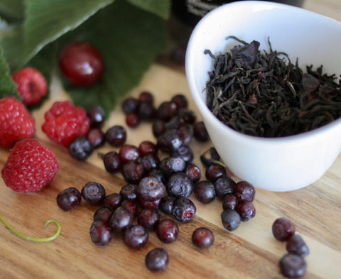 Two boxes of Lake Missoula Tea Company's High Country Huckleberry tea with tea bags inside, showcasing the packaging.