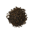 Mammoth Red tea from Lake Missoula Tea Company, loose leaf tea blend with deep red and earthy leaves in a clear container.