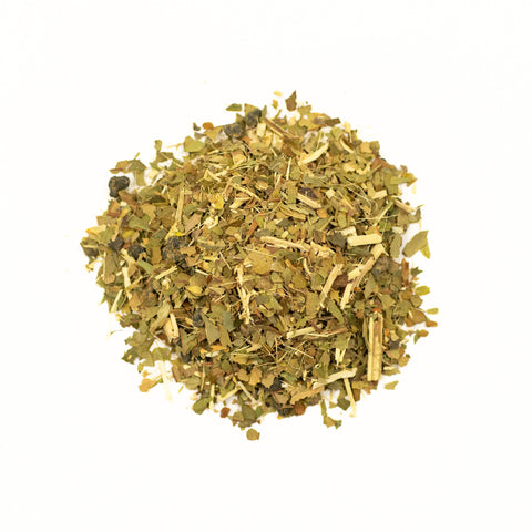 Lake Missoula Tea Company's Stamina tea in a colorful box, with teacup and loose tea leaves visible.