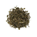 White Panda tea leaves from Lake Missoula Tea Company in a clear glass jar with a panda illustration on the label.