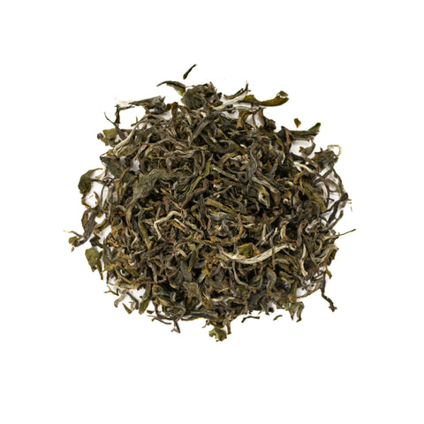 White Panda tea leaves from Lake Missoula Tea Company in a clear glass jar with a panda illustration on the label.