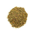 Belly Bliss tea by Lake Missoula Tea Company featuring raspberry leaf in a clear glass cup on a wooden surface