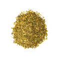 Lake Missoula Tea Company's Big Sky Breeze tea in a clear glass cup with a teabag and fresh mint leaves, ready to enjoy.