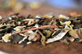 Close-up of Lake Missoula Tea Company's Cinnamon Chaga Spice tea in a cup, showcasing the rich cinnamon and chaga mushroom ingredients.