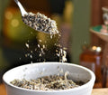 Cup of Lavender Lift tea by Lake Missoula Tea Company featuring a fragrant lavender-infused herbal tea in a clear glass mug.