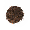 Lake Missoula Tea Company's Tiramisu flavored tea in a teacup, showcasing a rich, creamy dessert-inspired tea blend.