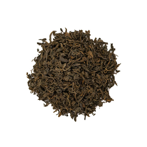 Loose Puerh Earl Grey tea leaves from Lake Missoula Tea Company in a clear glass jar.