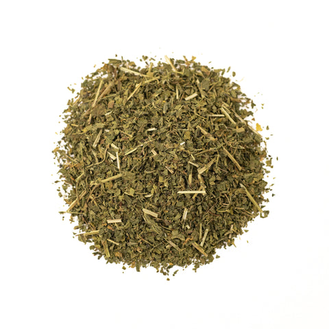 Fresh dried nettles tea leaves from Lake Missoula Tea Company, shown in a close-up image.