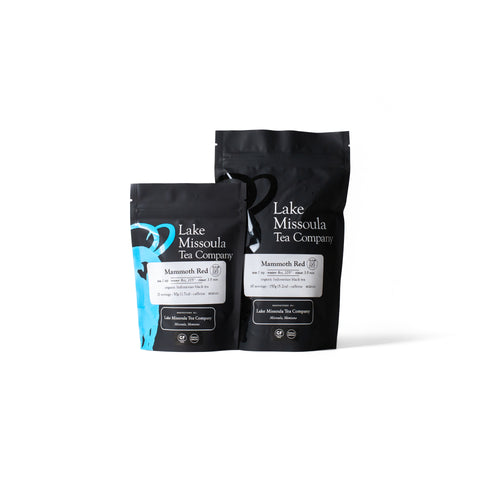 Assorted tea bags from Lake Missoula Tea Company's Top Shelf Tea Collection in colorful packaging.