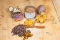 A steaming cup of Mushies’ Instant Cup™ tea from Lake Missoula Tea Company with tea bag and fresh ingredients visible.