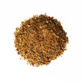 Christmas Tea Caffeine-Free herbal blend in a decorative mug, included in the Holiday Tea Bundle