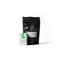 Assorted powdered teas in the Lake Missoula Tea Company Powder Tea Bundle, including Mammoth Matcha, arranged in a natural setting.