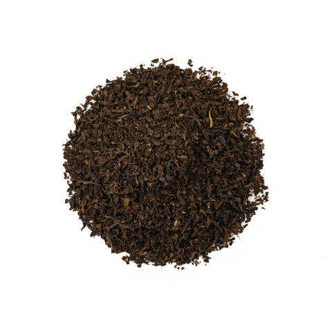 Dry Keemun black tea leaves from Lake Missoula Tea Company, showcasing the rich, dark tea leaves in a natural setting.