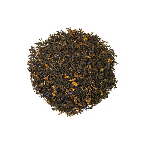 Loose Empress Grey tea leaves from Lake Missoula Tea Company in a clear glass jar, showcasing the aromatic grey tea blend.