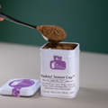 Mushies’ Instant Cup™ tea by Lake Missoula Tea Company in a clear plastic cup with tea bags and branding visible.