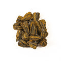 Yunnan Black Tower tea by Lake Missoula Tea Company, showing stacked dark tea leaves in a clear glass container.