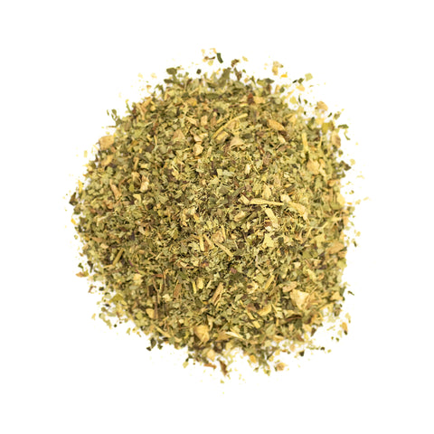 Cup of Lake Missoula Tea Company's Internal Bliss #2 Regular Move Blend herbal tea in a white mug, with tea leaves visible.