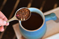 Dry Cape Town Grey Rooibos tea leaves in a spoon, showcasing the Lake Missoula Tea Company product.