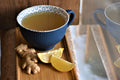 Cold ginger lemon tea in a glass with ice, showcasing Lake Missoula Tea Company's Spicy Ginger Snap flavor.