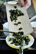 Lake Missoula Tea Company Cha Dao tea set with teaware pieces arranged on a wooden surface, ideal for traditional tea brewing.