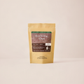 Evening Chai in 2oz winter collection packaging. Tan bag with brown label