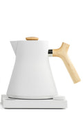 Fellow Corvo electric water heater for tea, compact teaware from Lake Missoula Tea Company, with sleek design and digital controls.