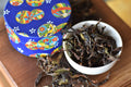 Close-up of Lake Missoula Tea Company's GABA Oolong tea leaves in a tin container, showcasing the premium tea packaging.