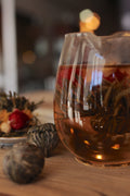 Flowering tea from Lake Missoula Tea Company, double happiness blend, beautifully arranged blooming tea ball in a clear glass cup.