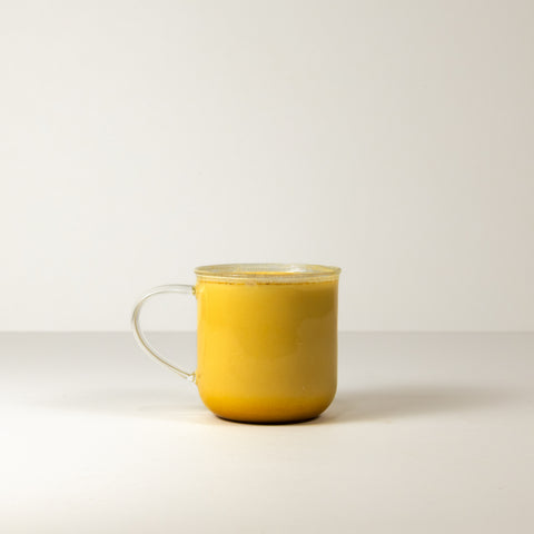Golden milk tea by Lake Missoula Tea Company in a cup, featuring a warm, golden-colored beverage with a smooth, inviting appearance.