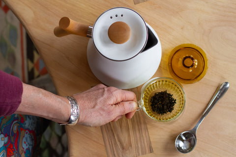 Horizontal image of Lake Missoula Tea Company's Mammoth Red tea packaging with a vibrant red tea bag and branding details.