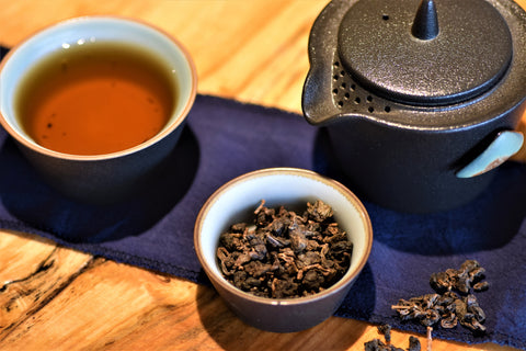 Loose leaf Java Oolong tea from Lake Missoula Tea Company, showcasing its dark, rolled tea leaves with a rich aroma.
