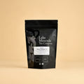 Big Sky Salted Caramel Tea in the larger black Lake Missoula Tea Company bag, used for the 100g, 200g and 500g sizes