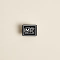Black LMTC Drink Tea Read Books enamel pin