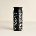 Black 12 oz tumbler with botanical leaf print and Missoula, MT