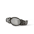 Lace teaware strainer from Lake Missoula Tea Company with intricate lace design for brewing loose leaf tea.