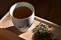 Loose leaf Moroccan Mint tea from Lake Missoula Tea Company with fresh green mint leaves and fragrant tea leaves.
