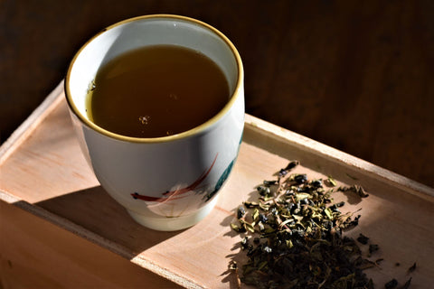 Loose leaf Moroccan Mint tea from Lake Missoula Tea Company with fresh green mint leaves and fragrant tea leaves.