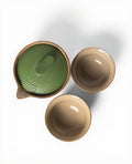 Overhead view of Lake Missoula Tea Company Eastern Elm Clay Travel Gaiwan Set with green Gong Fu teaware and accessories.