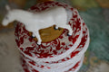 Green Puerh wedding cake tea from Lake Missoula Tea Company, showing a traditional compressed tea cake with green tea leaves.