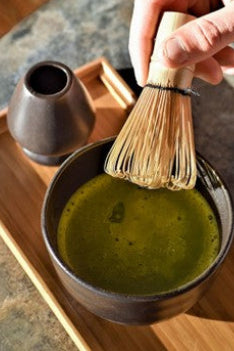 Lake Missoula Tea Company matcha tea set with a bowl, whisk, and scoop for preparing traditional matcha tea.